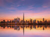 Dubai skyline at sunset, including Burj Khalifa