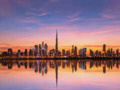 Dubai skyline at sunset, including Burj Khalifa