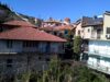 Αρχειακή φωτογραφία κτισμάτων και της εκκλησίας στην κοινότητα Χανδριών